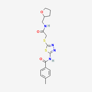 molecular formula C17H20N4O3S2 B2799726 4-methyl-N-(5-((2-oxo-2-(((tetrahydrofuran-2-yl)methyl)amino)ethyl)thio)-1,3,4-thiadiazol-2-yl)benzamide CAS No. 868976-29-8