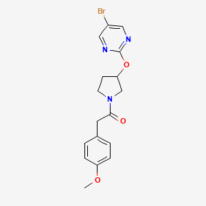 1-{3-[(5-Bromopyrimidin-2-yl)oxy]pyrrolidin-1-yl}-2-(4-methoxyphenyl)ethan-1-one