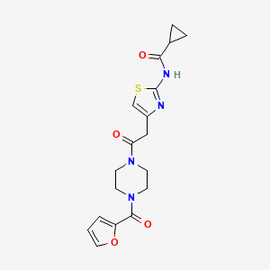 molecular formula C18H20N4O4S B2800056 N-(4-(2-(4-(furan-2-carbonyl)piperazin-1-yl)-2-oxoethyl)thiazol-2-yl)cyclopropanecarboxamide CAS No. 923174-08-7