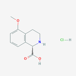 (1S)-5-methoxy-1,2,3,4-tetrahydroisoquinoline-1-carboxylic acid hydrochloride