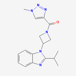 molecular formula C17H20N6O B2800992 (1-Methyltriazol-4-yl)-[3-(2-propan-2-ylbenzimidazol-1-yl)azetidin-1-yl]methanone CAS No. 2415469-72-4