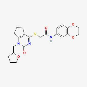 molecular formula C22H25N3O5S B2802373 N-(2,3-dihydrobenzo[b][1,4]dioxin-6-yl)-2-((2-oxo-1-((tetrahydrofuran-2-yl)methyl)-2,5,6,7-tetrahydro-1H-cyclopenta[d]pyrimidin-4-yl)thio)acetamide CAS No. 899756-22-0