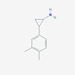 molecular formula C11H15N B2803754 2-(3,4-Dimethylphenyl)cyclopropan-1-amine CAS No. 1157555-70-8