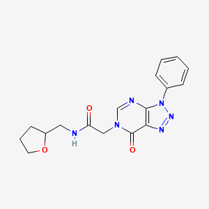 molecular formula C17H18N6O3 B2803915 N-(2-oxolanylmethyl)-2-(7-oxo-3-phenyl-6-triazolo[4,5-d]pyrimidinyl)acetamide CAS No. 863018-68-2