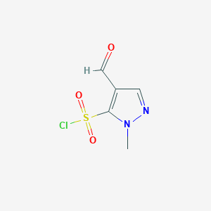 molecular formula C5H5ClN2O3S B2805958 4-formyl-1-methyl-1H-pyrazole-5-sulfonyl chloride CAS No. 2138573-84-7