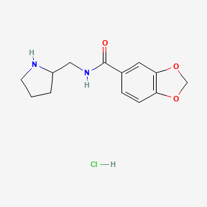 molecular formula C13H17ClN2O3 B2806532 N-(Pyrrolidin-2-ylmethyl)benzo[d][1,3]dioxole-5-carboxamide hydrochloride CAS No. 1353947-84-8