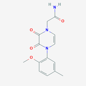 molecular formula C14H15N3O4 B2807276 2-[4-(2-Methoxy-5-methylphenyl)-2,3-dioxopyrazin-1-yl]acetamide CAS No. 898463-83-7