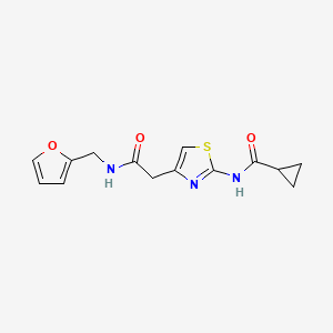 molecular formula C14H15N3O3S B2807460 N-(4-(2-((furan-2-ylmethyl)amino)-2-oxoethyl)thiazol-2-yl)cyclopropanecarboxamide CAS No. 923115-19-9