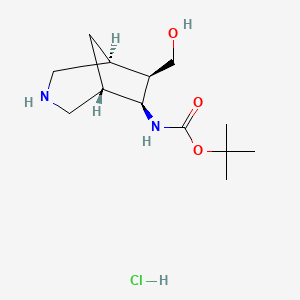 molecular formula C13H25ClN2O3 B2807488 叔丁基N-[(1S,5S,6S,7R)-7-(羟甲基)-3-氮杂双环[3.2.1]辛-6-基]碳酸酯；盐酸 CAS No. 2490322-93-3