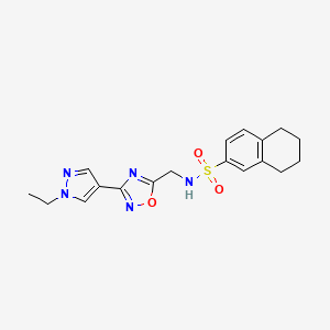 molecular formula C18H21N5O3S B2807616 N-((3-(1-ethyl-1H-pyrazol-4-yl)-1,2,4-oxadiazol-5-yl)methyl)-5,6,7,8-tetrahydronaphthalene-2-sulfonamide CAS No. 2034516-80-6