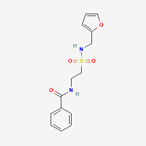 molecular formula C14H16N2O4S B2807697 N-[2-(呋喃-2-基甲基磺酰基)乙基]苯甲酰胺 CAS No. 899758-92-0