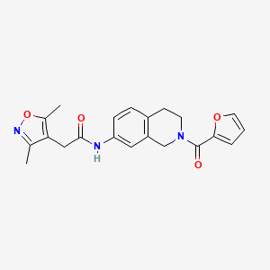 molecular formula C21H21N3O4 B2809378 2-(3,5-dimethylisoxazol-4-yl)-N-(2-(furan-2-carbonyl)-1,2,3,4-tetrahydroisoquinolin-7-yl)acetamide CAS No. 1448059-08-2