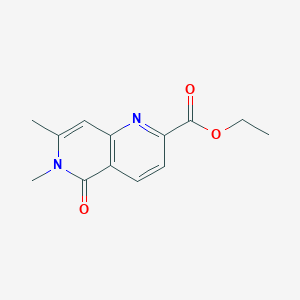 molecular formula C13H14N2O3 B2810358 Ethyl 6,7-dimethyl-5-oxo-1,6-naphthyridine-2-carboxylate CAS No. 2411302-44-6