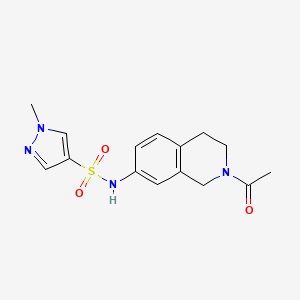 molecular formula C15H18N4O3S B2810363 N-(2-acetyl-1,2,3,4-tetrahydroisoquinolin-7-yl)-1-methyl-1H-pyrazole-4-sulfonamide CAS No. 1797970-88-7