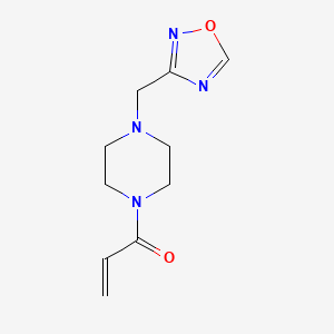 molecular formula C10H14N4O2 B2811561 1-[4-(1,2,4-Oxadiazol-3-ylmethyl)piperazin-1-yl]prop-2-en-1-one CAS No. 2175581-12-9