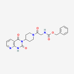 molecular formula C22H23N5O5 B2811567 benzyl (2-(4-(2,4-dioxo-1,2-dihydropyrido[2,3-d]pyrimidin-3(4H)-yl)piperidin-1-yl)-2-oxoethyl)carbamate CAS No. 2034554-30-6