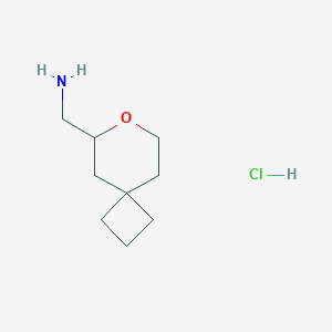 7-Oxaspiro[3.5]nonan-8-ylmethanamine;hydrochloride