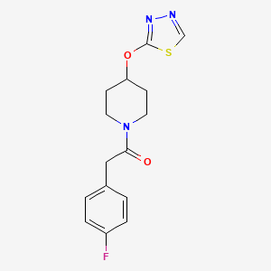 molecular formula C15H16FN3O2S B2812266 1-(4-((1,3,4-Thiadiazol-2-yl)oxy)piperidin-1-yl)-2-(4-fluorophenyl)ethan-1-one CAS No. 2176070-26-9