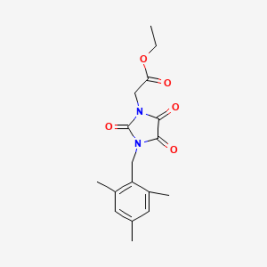 B2813277 Ethyl 2-[3-(mesitylmethyl)-2,4,5-trioxo-1-imidazolidinyl]acetate CAS No. 303986-40-5
