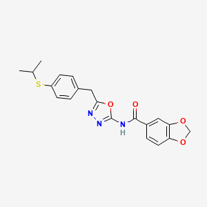 molecular formula C20H19N3O4S B2813522 N-(5-(4-(isopropylthio)benzyl)-1,3,4-oxadiazol-2-yl)benzo[d][1,3]dioxole-5-carboxamide CAS No. 1171544-09-4