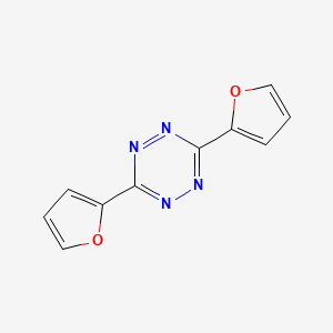 molecular formula C10H6N4O2 B2814059 3,6-Bis(furan-2-yl)-1,2,4,5-tetrazine CAS No. 59918-48-8