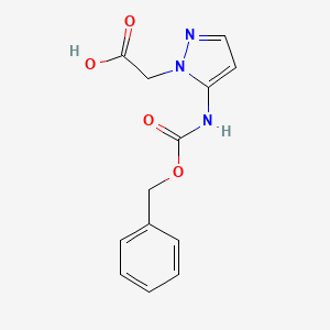 molecular formula C13H13N3O4 B2814147 2-[5-(Phenylmethoxycarbonylamino)pyrazol-1-yl]acetic acid CAS No. 2287274-62-6