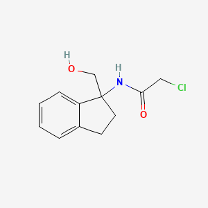 molecular formula C12H14ClNO2 B2814676 2-Chloro-N-[1-(hydroxymethyl)-2,3-dihydroinden-1-yl]acetamide CAS No. 2027494-79-5