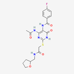 molecular formula C20H22FN5O5S B2816128 N-(4-acetamido-6-oxo-2-((2-oxo-2-(((tetrahydrofuran-2-yl)methyl)amino)ethyl)thio)-1,6-dihydropyrimidin-5-yl)-4-fluorobenzamide CAS No. 872608-84-9