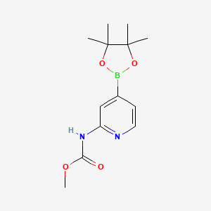 molecular formula C13H19BN2O4 B2816360 2-((Methoxycarbonyl)amino)pyridine-4-boronic acid pinacol ester CAS No. 1353004-64-4