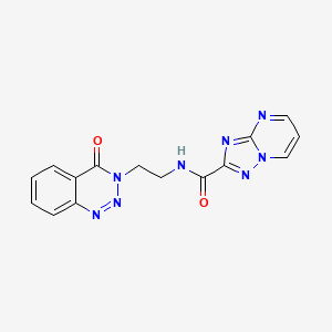 molecular formula C15H12N8O2 B2817036 N-(2-(4-oxobenzo[d][1,2,3]triazin-3(4H)-yl)ethyl)-[1,2,4]triazolo[1,5-a]pyrimidine-2-carboxamide CAS No. 2034274-01-4