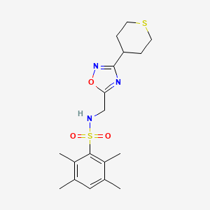 molecular formula C18H25N3O3S2 B2817464 2,3,5,6-tetramethyl-N-((3-(tetrahydro-2H-thiopyran-4-yl)-1,2,4-oxadiazol-5-yl)methyl)benzenesulfonamide CAS No. 2034293-26-8