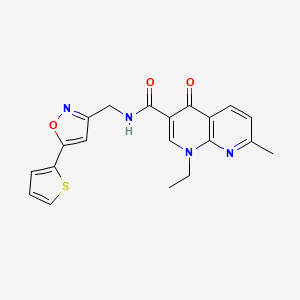 molecular formula C20H18N4O3S B2817822 1-乙基-7-甲基-4-氧代-N-((5-(噻吩-2-基)异噁唑-3-基)甲基)-1,4-二氢-1,8-萘啉-3-甲酰胺 CAS No. 1210144-99-2