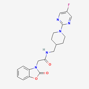 molecular formula C19H20FN5O3 B2817932 N-[[1-(5-Fluoropyrimidin-2-yl)piperidin-4-yl]methyl]-2-(2-oxo-1,3-benzoxazol-3-yl)acetamide CAS No. 2415526-75-7