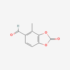 molecular formula C9H6O4 B2818028 4-Methyl-2-oxobenzo[d][1,3]dioxole-5-carbaldehyde CAS No. 861560-76-1