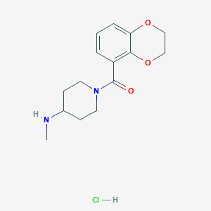 molecular formula C15H21ClN2O3 B2818309 (2,3-Dihydrobenzo[b][1,4]dioxin-5-yl)(4-(methylamino)piperidin-1-yl)methanone hydrochloride CAS No. 1353978-43-4