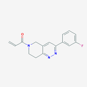 molecular formula C16H14FN3O B2818357 1-[3-(3-Fluorophenyl)-7,8-dihydro-5H-pyrido[4,3-c]pyridazin-6-yl]prop-2-en-1-one CAS No. 2324420-97-3