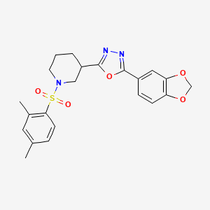 molecular formula C22H23N3O5S B2818555 2-(Benzo[d][1,3]dioxol-5-yl)-5-(1-((2,4-dimethylphenyl)sulfonyl)piperidin-3-yl)-1,3,4-oxadiazole CAS No. 1170528-73-0