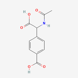 4-[Acetamido(carboxy)methyl]benzoic acid