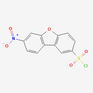 molecular formula C12H6ClNO5S B2820663 7-nitrodibenzofuran-2-sulfonyl Chloride CAS No. 98045-13-7