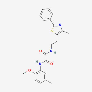 molecular formula C22H23N3O3S B2820664 N1-(2-methoxy-5-methylphenyl)-N2-(2-(4-methyl-2-phenylthiazol-5-yl)ethyl)oxalamide CAS No. 894011-44-0