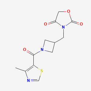 molecular formula C12H13N3O4S B2820995 3-((1-(4-Methylthiazole-5-carbonyl)azetidin-3-yl)methyl)oxazolidine-2,4-dione CAS No. 2034338-68-4