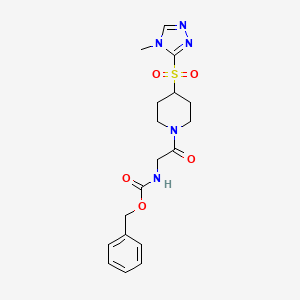 benzyl (2-(4-((4-methyl-4H-1,2,4-triazol-3-yl)sulfonyl)piperidin-1-yl)-2-oxoethyl)carbamate