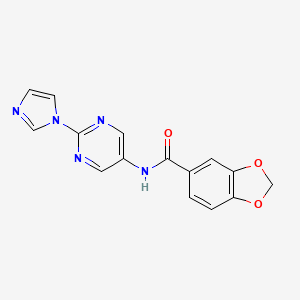 molecular formula C15H11N5O3 B2821255 N-(2-(1H-咪唑-1-基)嘧啶-5-基)苯并[d][1,3]二噁嗪-5-甲酰胺 CAS No. 1421483-44-4
