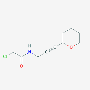 molecular formula C10H14ClNO2 B2821308 2-Chloro-N-[3-(oxan-2-yl)prop-2-ynyl]acetamide CAS No. 2411220-91-0