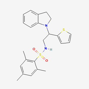 N-(2-(indolin-1-yl)-2-(thiophen-2-yl)ethyl)-2,4,6-trimethylbenzenesulfonamide