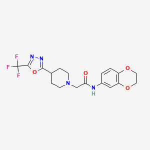 molecular formula C18H19F3N4O4 B2822793 N-(2,3-dihydrobenzo[b][1,4]dioxin-6-yl)-2-(4-(5-(trifluoromethyl)-1,3,4-oxadiazol-2-yl)piperidin-1-yl)acetamide CAS No. 1421532-89-9