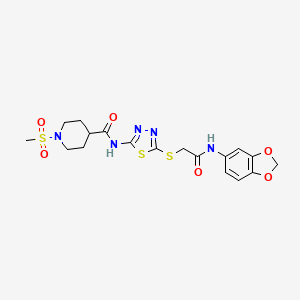 molecular formula C18H21N5O6S3 B2822900 N-(5-((2-(benzo[d][1,3]dioxol-5-ylamino)-2-oxoethyl)thio)-1,3,4-thiadiazol-2-yl)-1-(methylsulfonyl)piperidine-4-carboxamide CAS No. 1226436-97-0