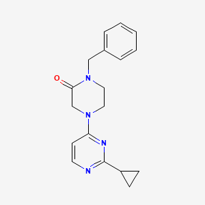 molecular formula C18H20N4O B2822904 1-Benzyl-4-(2-cyclopropylpyrimidin-4-yl)piperazin-2-one CAS No. 2415487-63-5