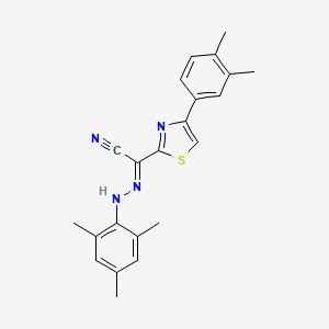 molecular formula C22H22N4S B2822983 (2E)-4-(3,4-dimethylphenyl)-N-(2,4,6-trimethylanilino)-1,3-thiazole-2-carboximidoyl cyanide CAS No. 477288-00-9