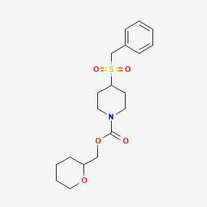 molecular formula C19H27NO5S B2823123 (四氢-2H-吡喃-2-基)甲基-4-(苄磺酰基)哌啶-1-羧酸酯 CAS No. 2034227-03-5